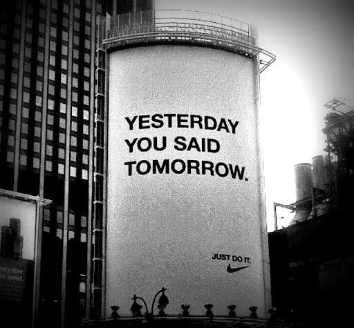 Nike billboard with bold text reading “Yesterday You Said Tomorrow” and the slogan “Just Do It.”