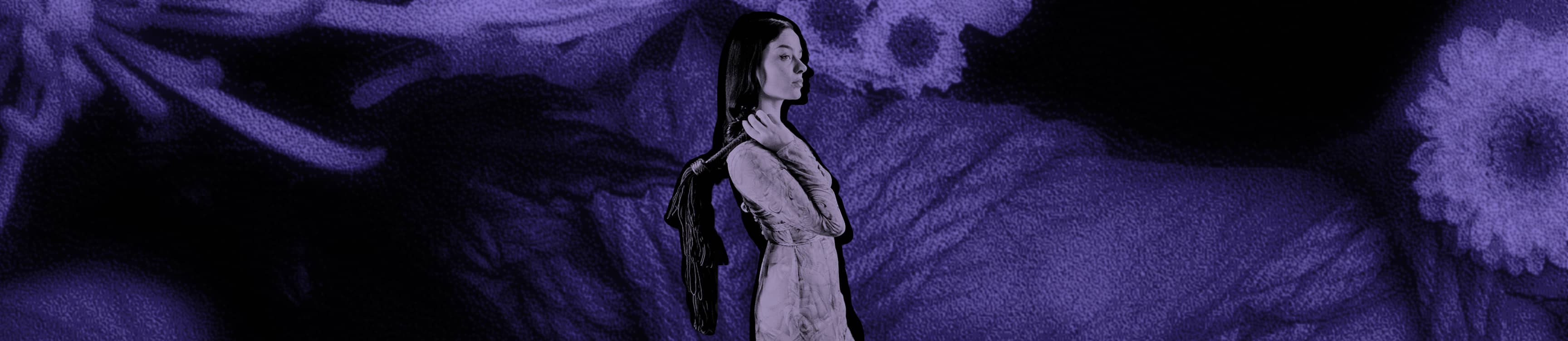woman holding flogger against abstract purple background with ropes.