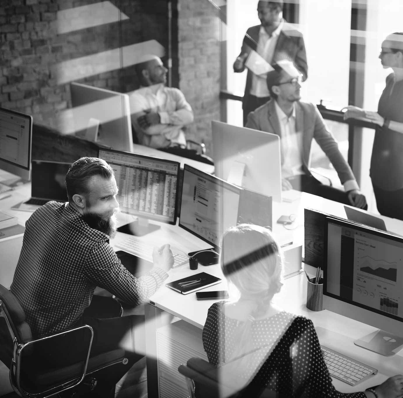 A busy modern office of business professionals 