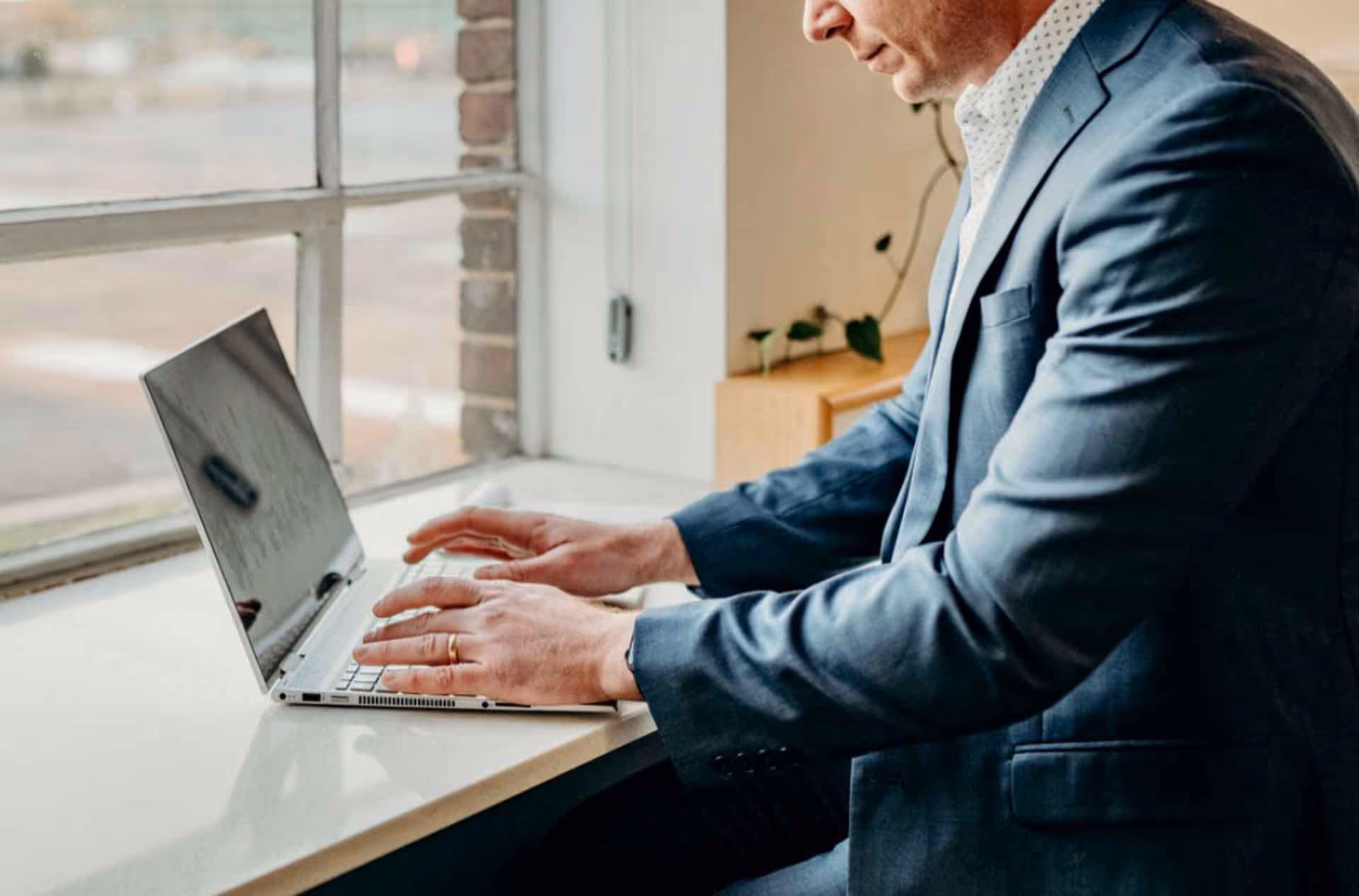 Dispensary bookkeeper reconciling Flowhub POS, BioTrack data, and financial statements for audit compliance