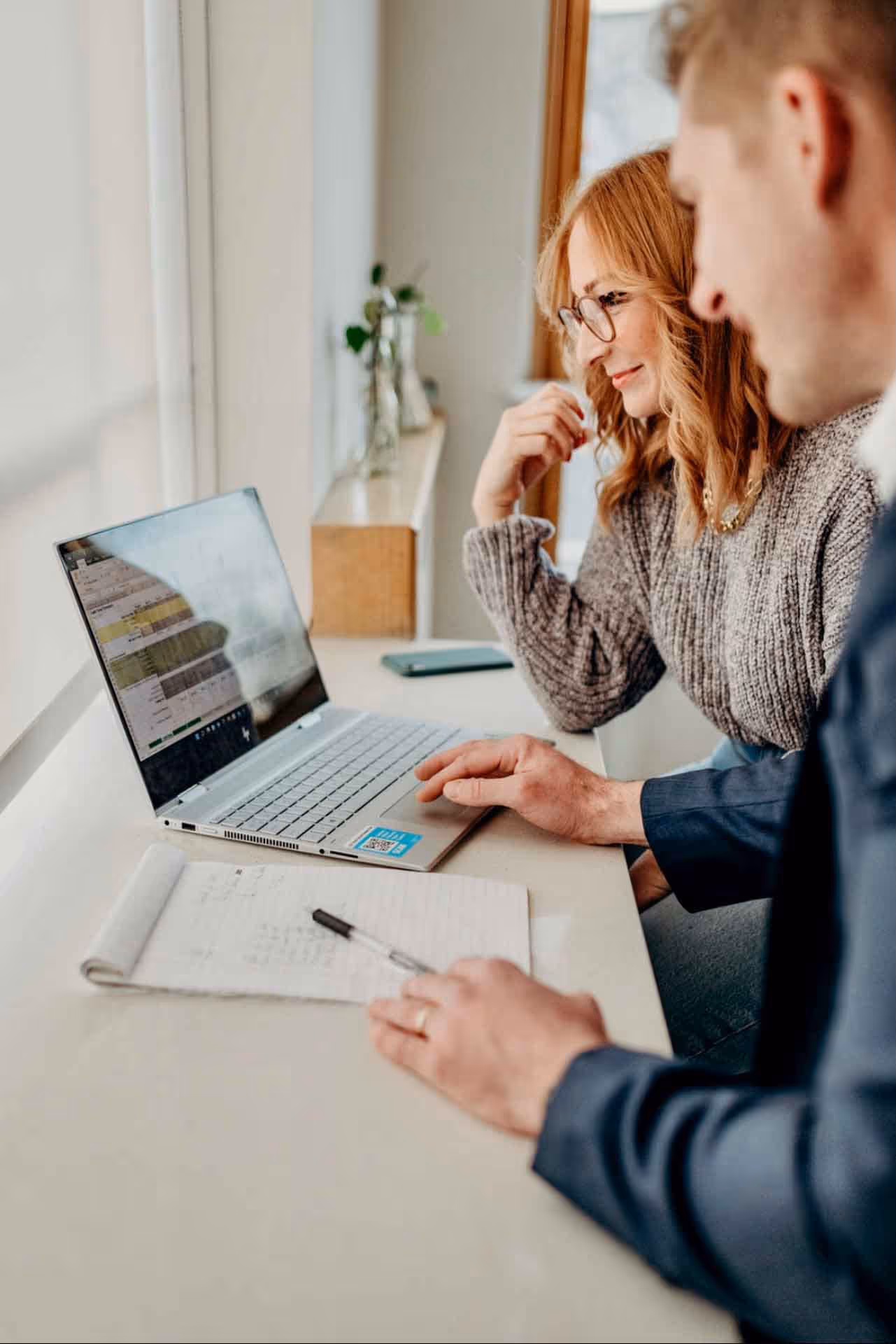 Accountant analyzing cannabis product profitability, sales channel revenue, and 280E tax allocation reports
