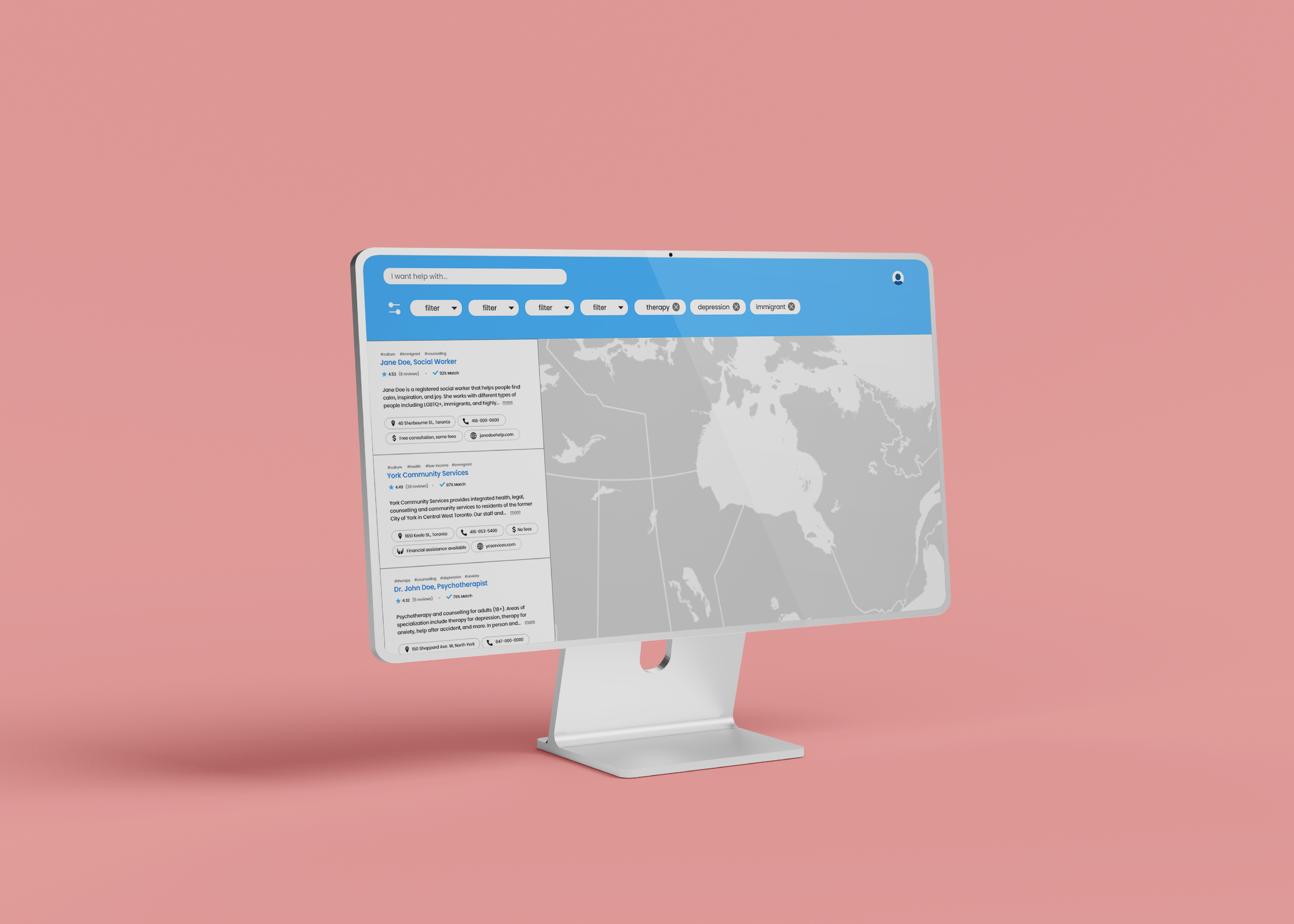 A computer monitor with the Mental Map prototype standing against a plain pink backdrop