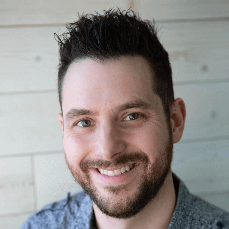 ppckirk williams smiles in emarie studio for professional headshot square social