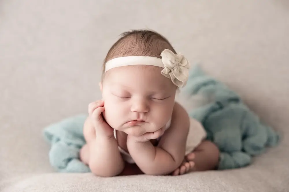 Newborn baby froggy pose professional newborn photography in Billings, MT