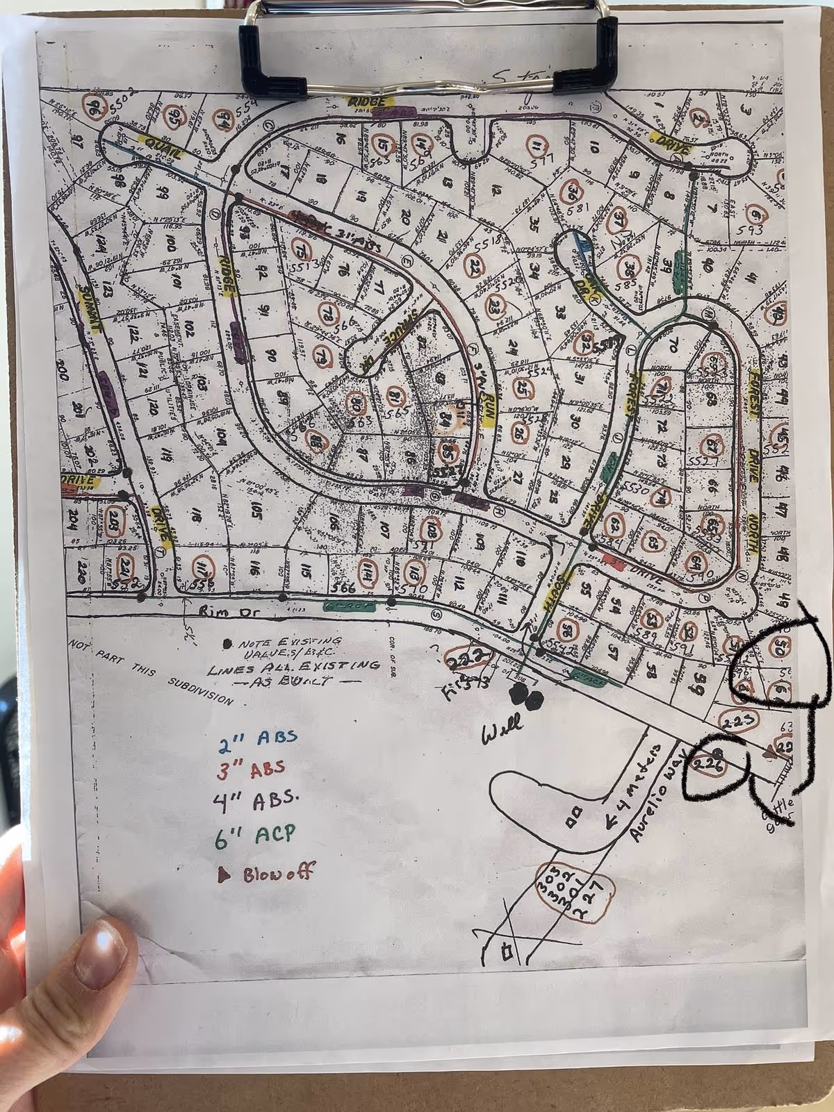 Hand-drawn paper utility map on a clipboard — the kind of map Ziptility replaces