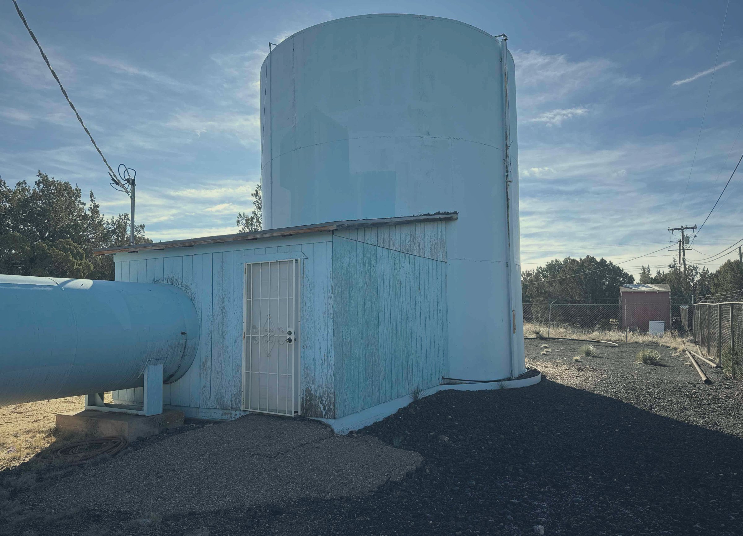 Steel storage tank and horizontal pressure vessel at a small water system
