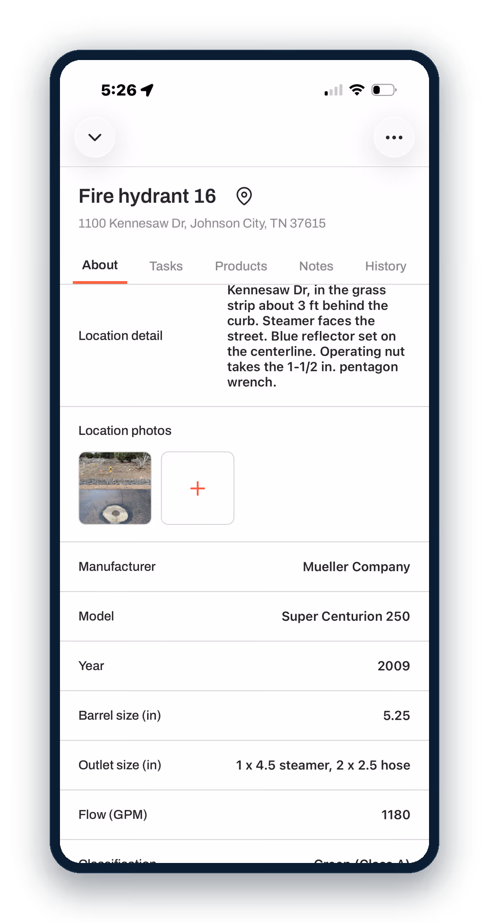 Ziptility on a phone: the asset record for Fire Hydrant 16 with photos, make, model, year and flow rate