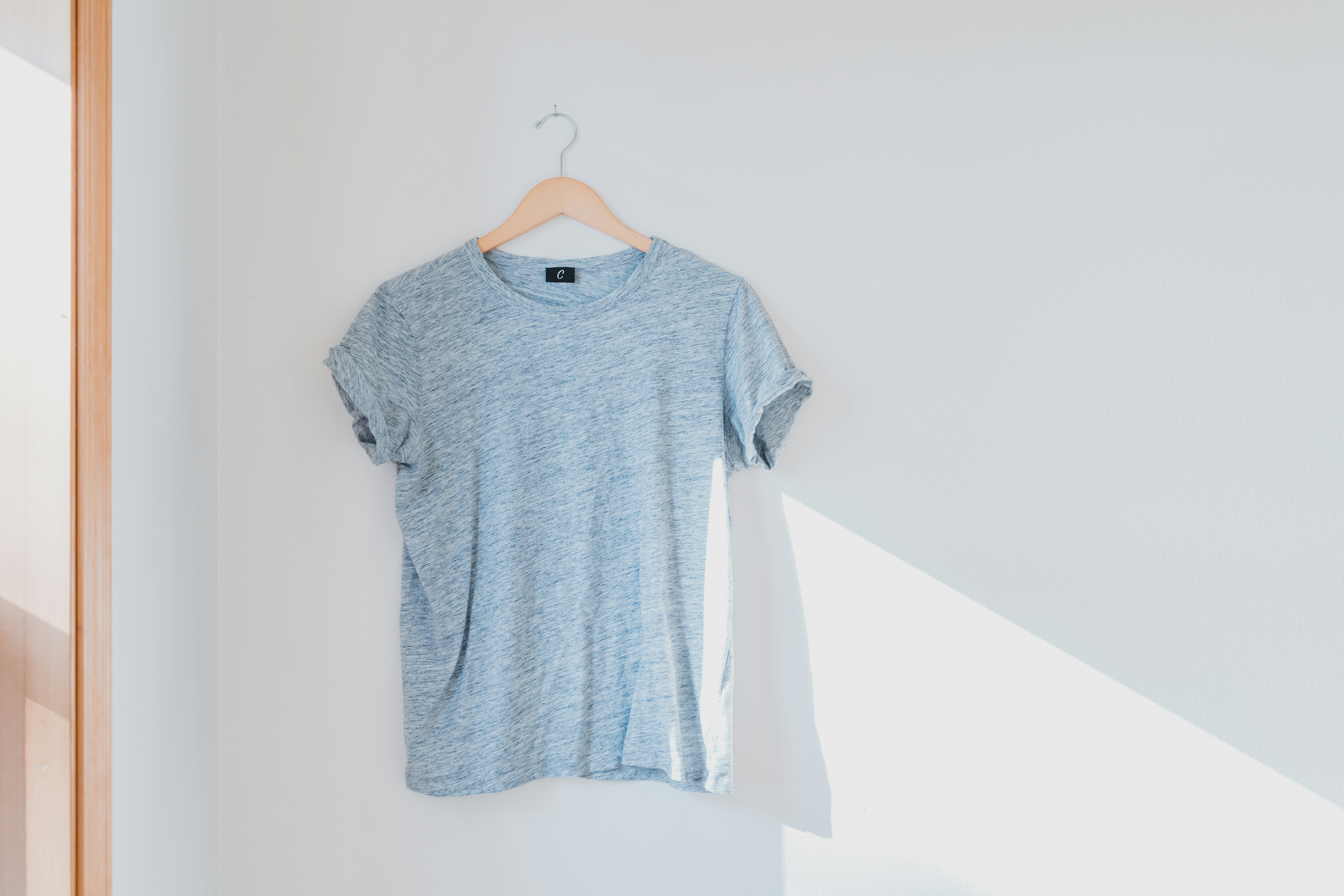 a blue shirt on a swinger