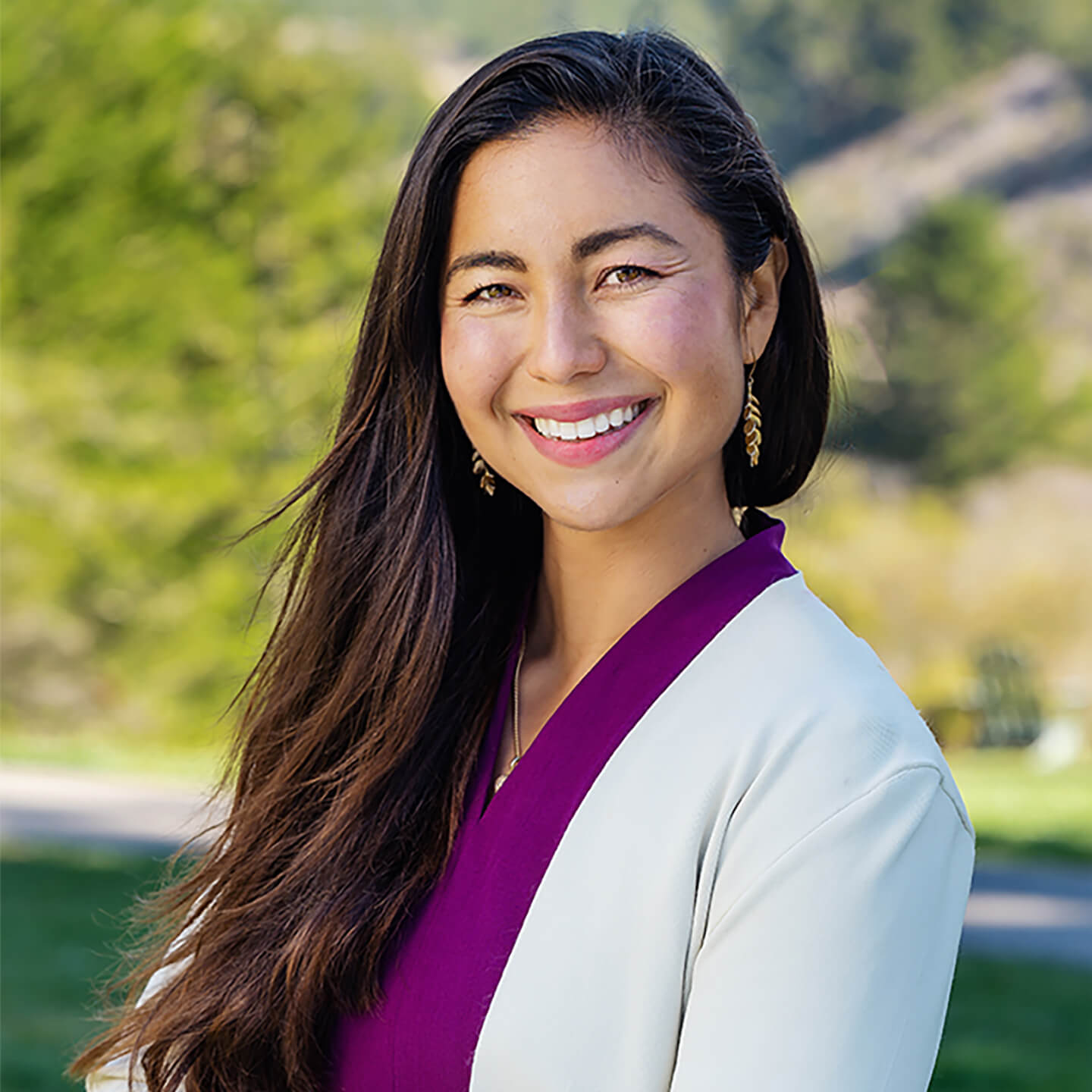 a woman smiling at camera