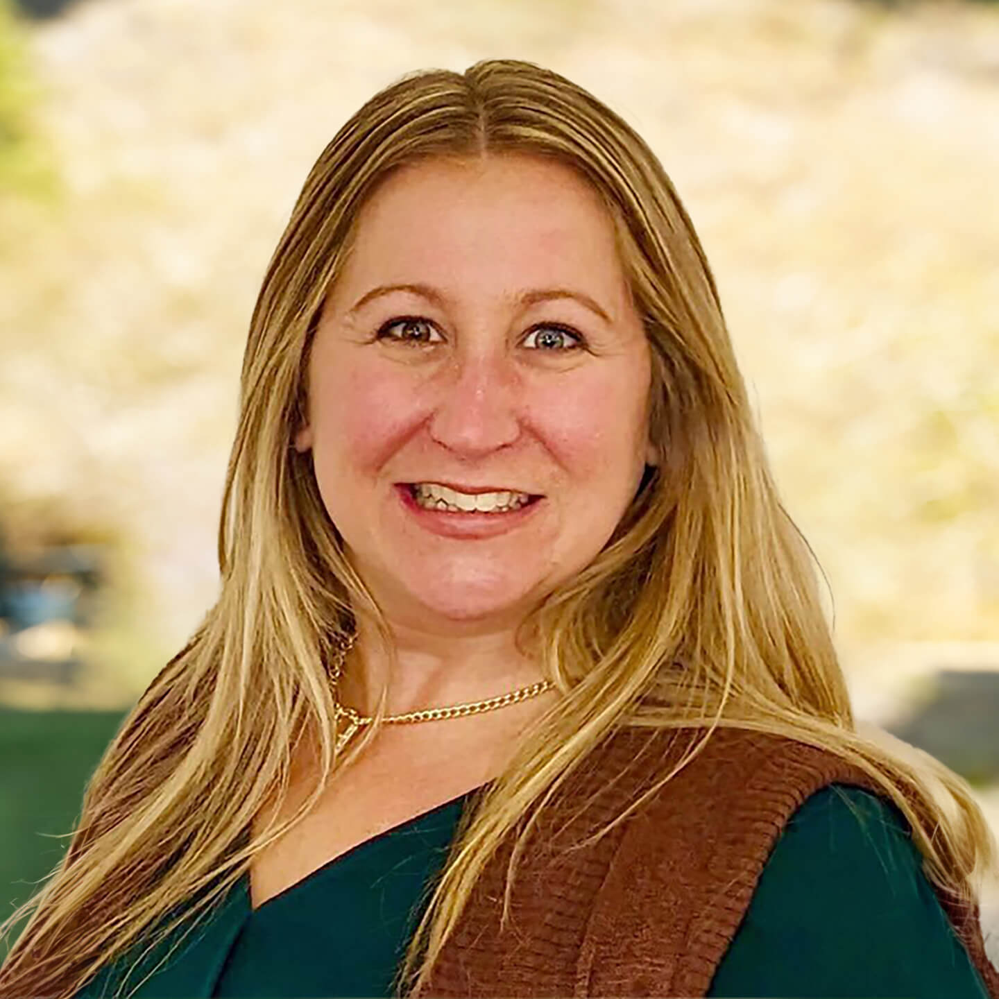 a woman smiling at camera