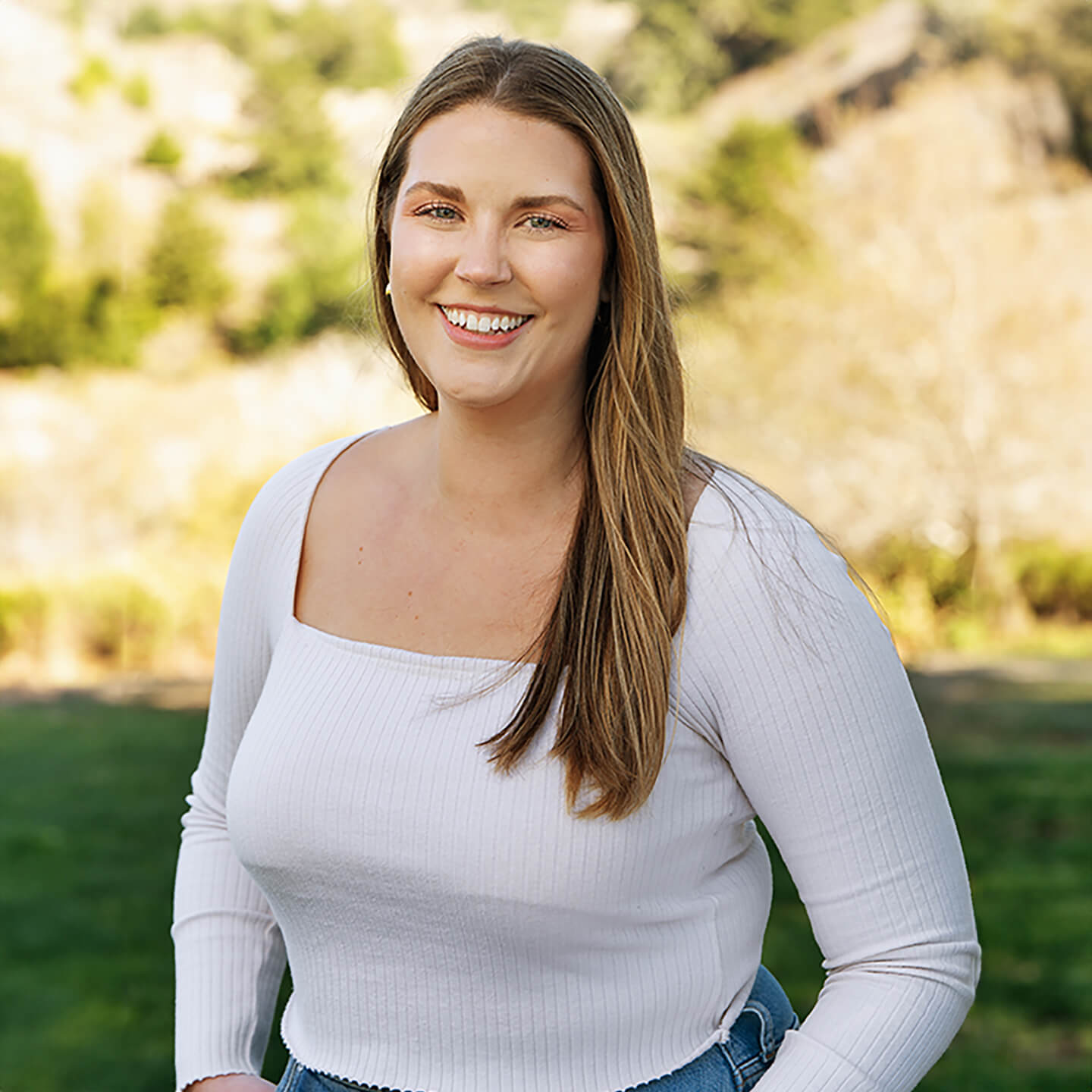 a woman smiling at camera