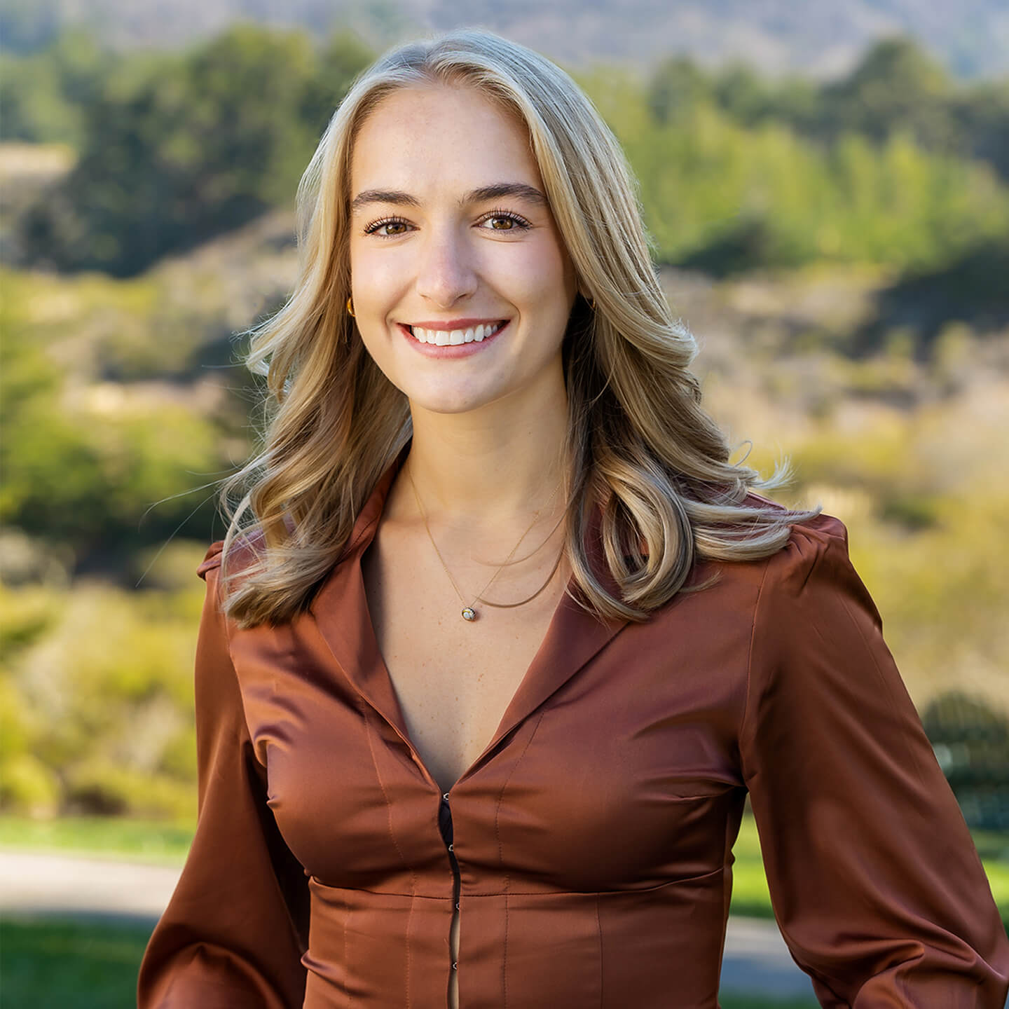 a woman smiling at camera
