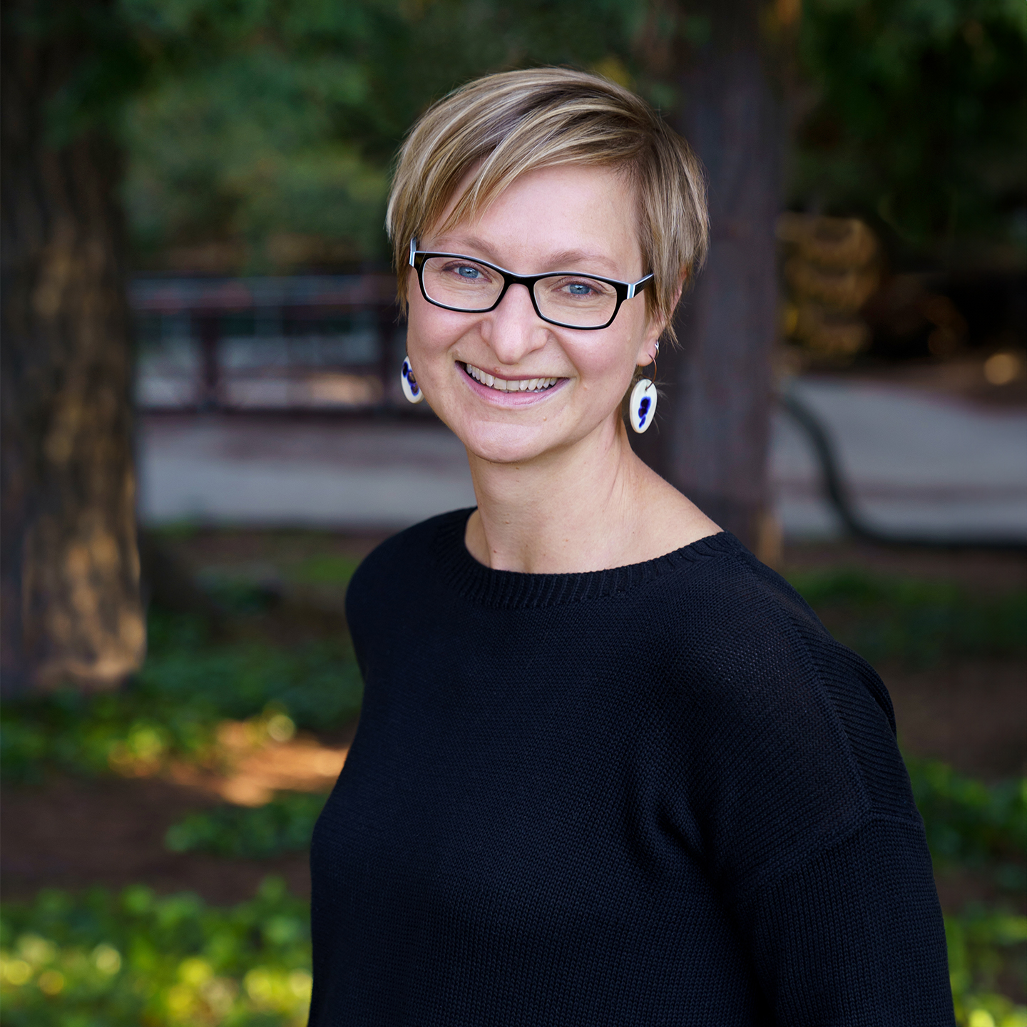 a woman smiling at camera