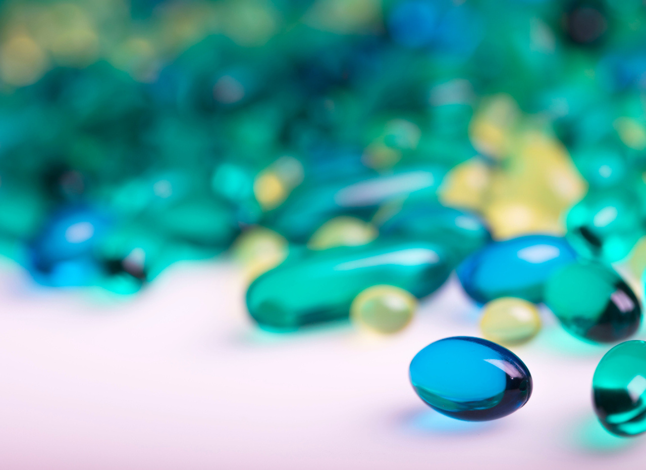 a close up of a blue pill