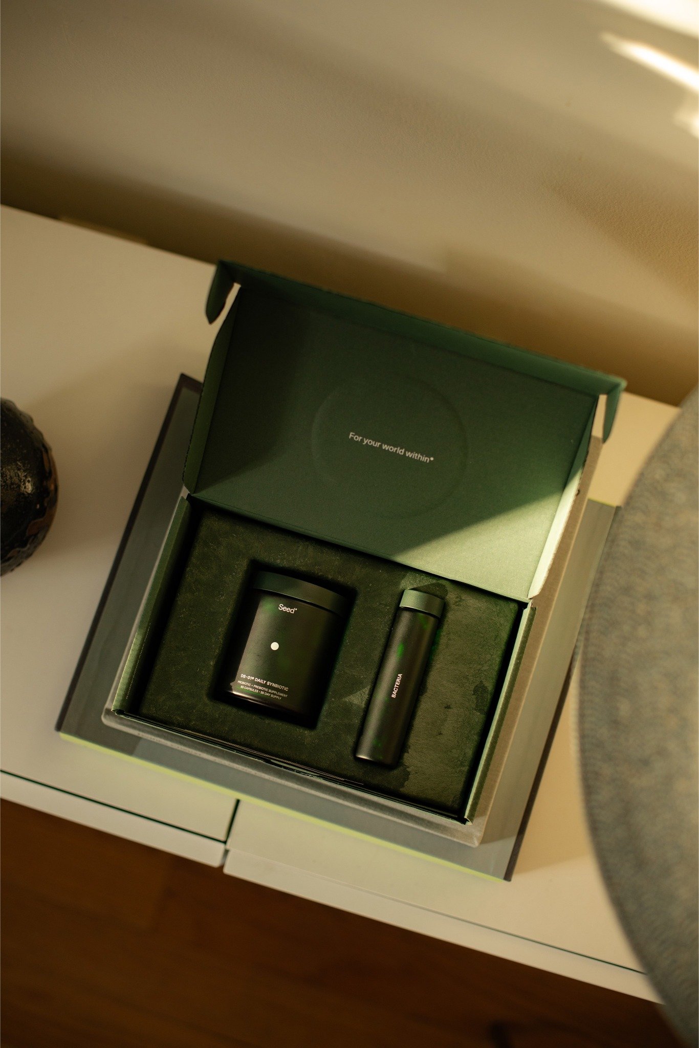 a box with a couple of black containers