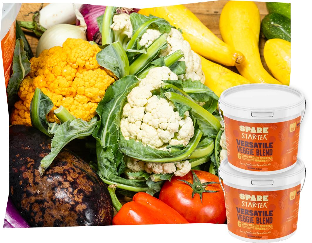 a group of vegetables and a bucket of food