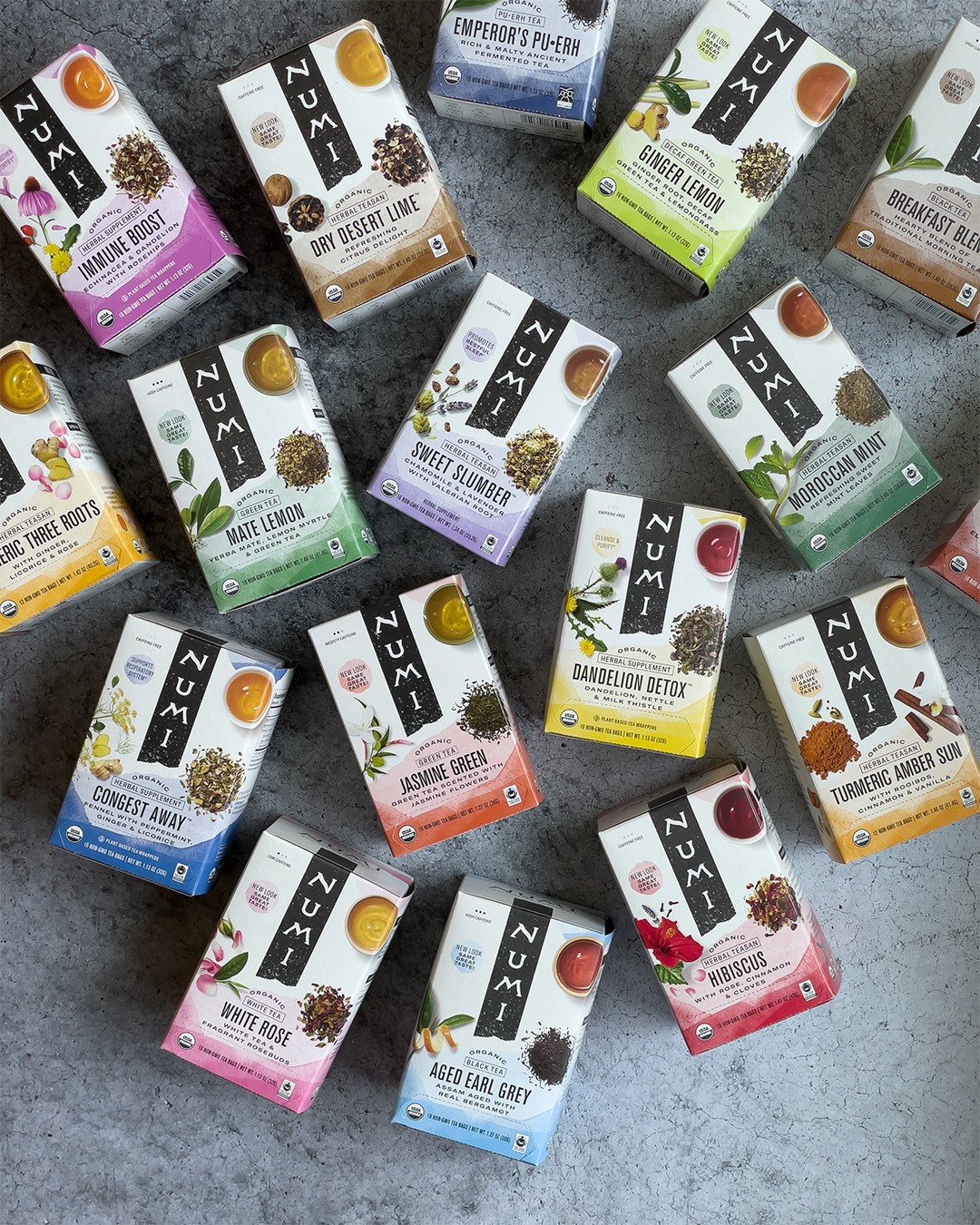 a group of boxes of different colored drinks