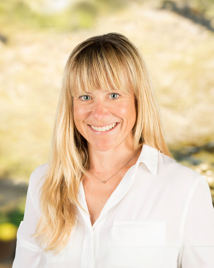 a woman smiling at camera