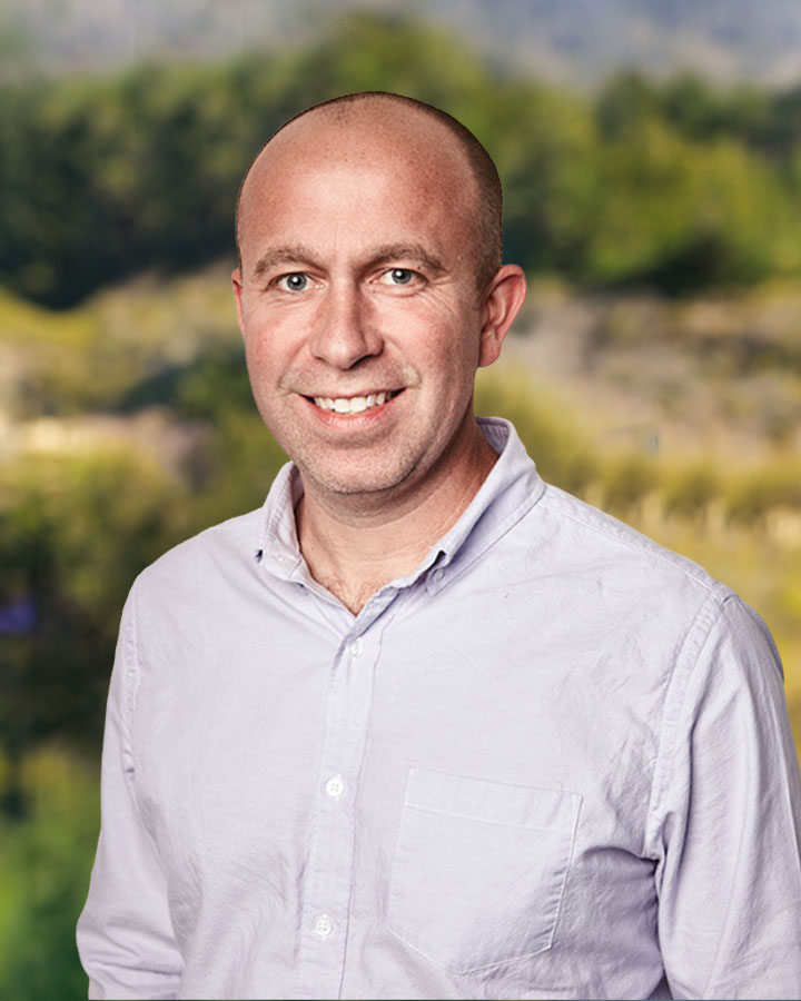 a man smiling for a picture