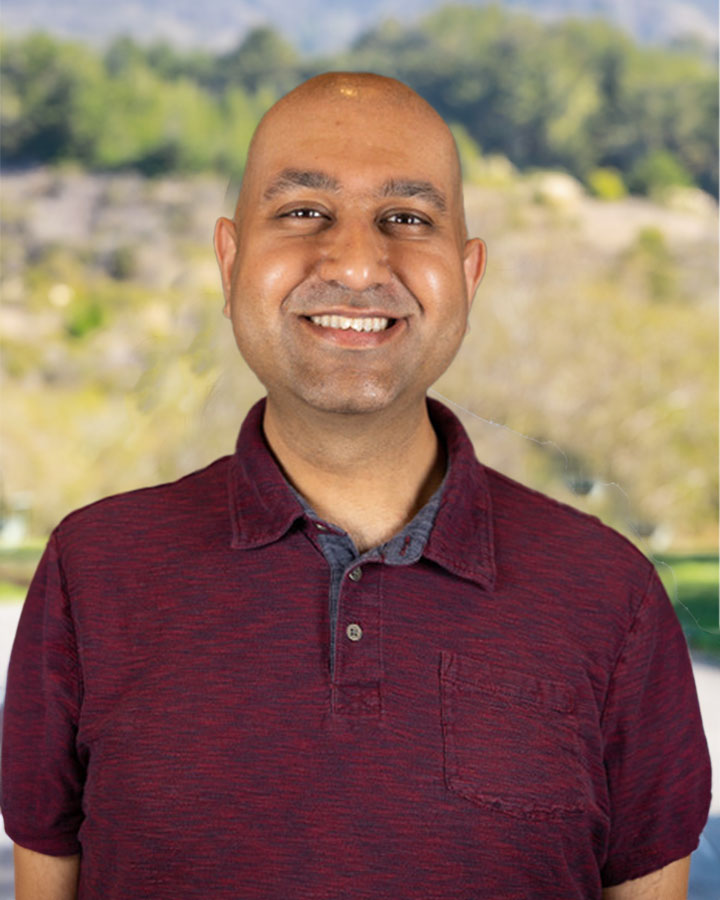 a man smiling for a picture
