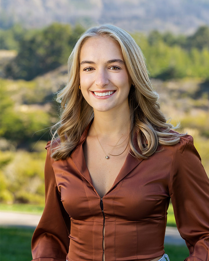 a woman smiling at camera