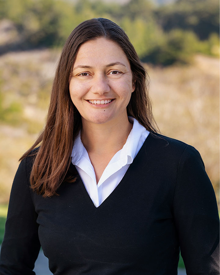 a woman smiling at camera