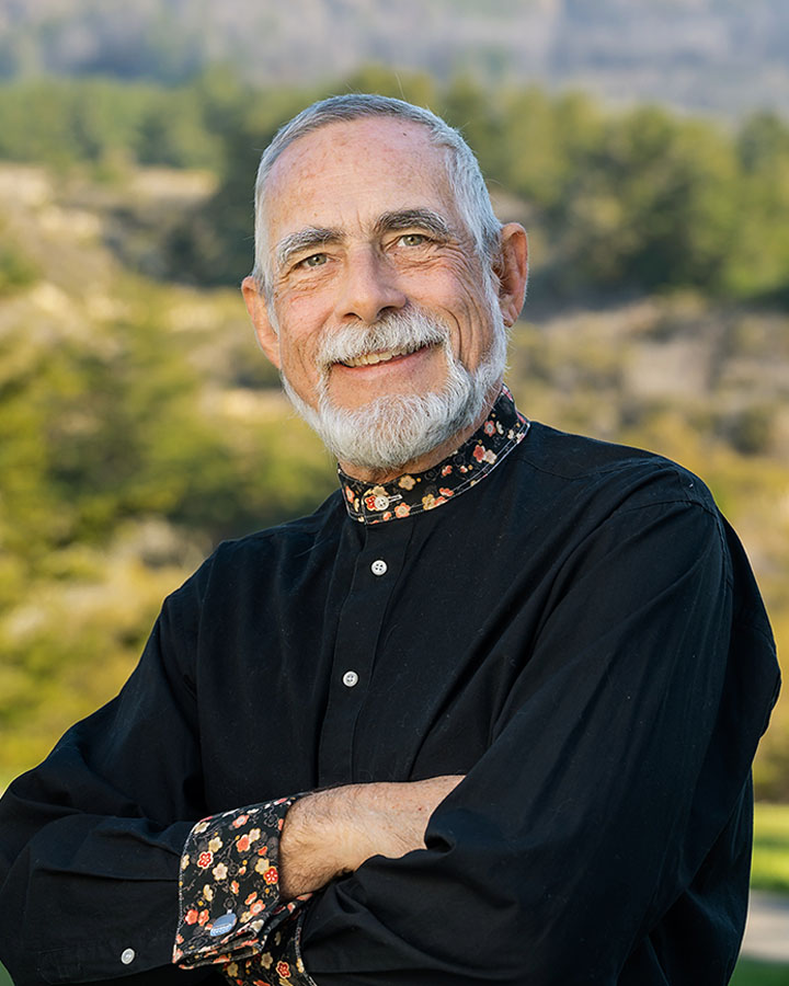 a man with a beard and a black shirt