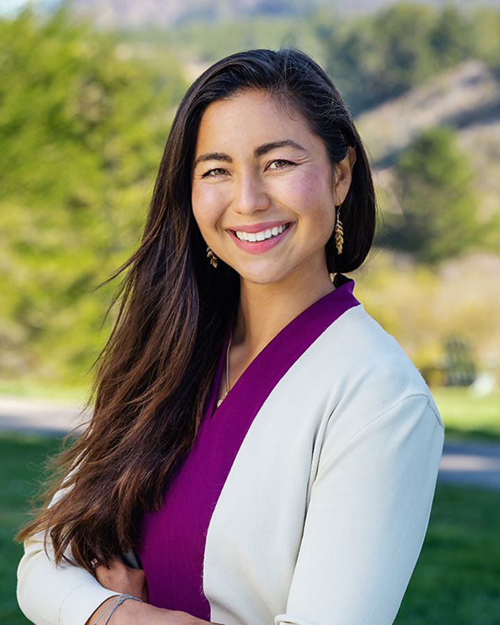 a woman smiling at camera