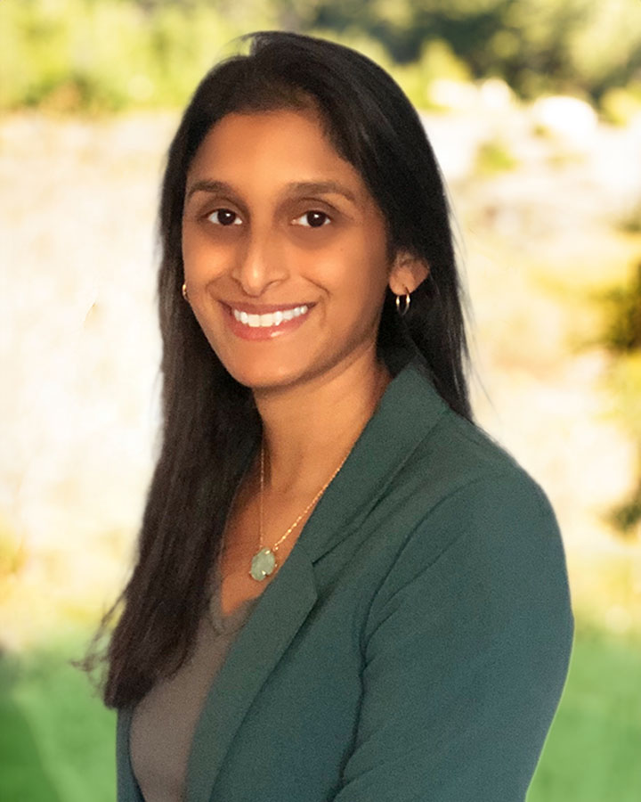 a woman smiling for a picture