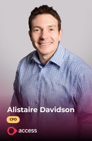 Smiling man in a blue checked shirt against a plain light background labeled Alistaire Davidson CFO.
