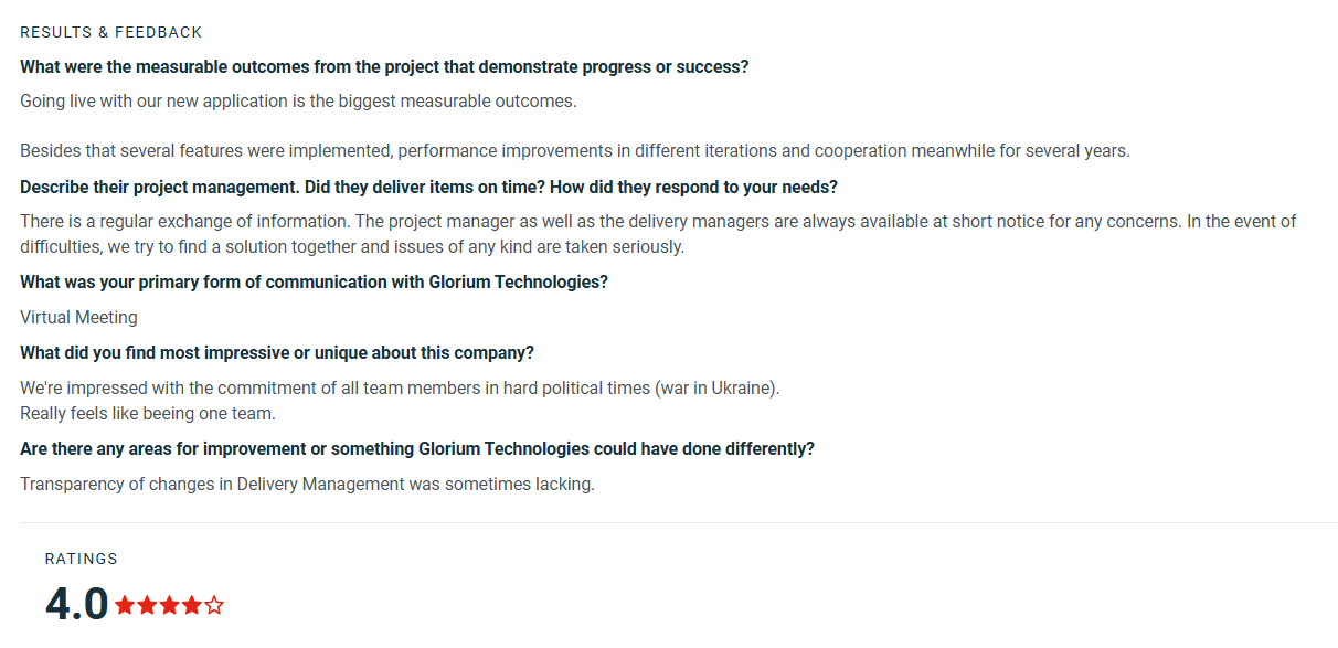 Screenshot of a four-star Glorium Technologies client review highlighting responsive project management, collaborative communication, successful application delivery, and suggestions for greater delivery management transparency.