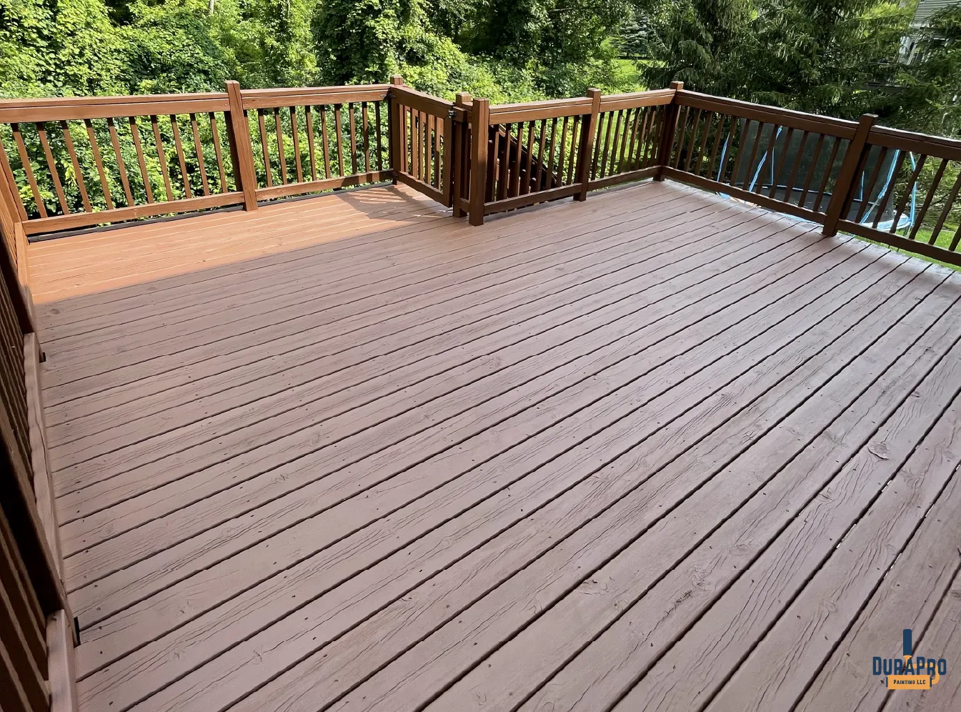 Backyard deck in Michigan that was stained by DuraPro Painting LLC