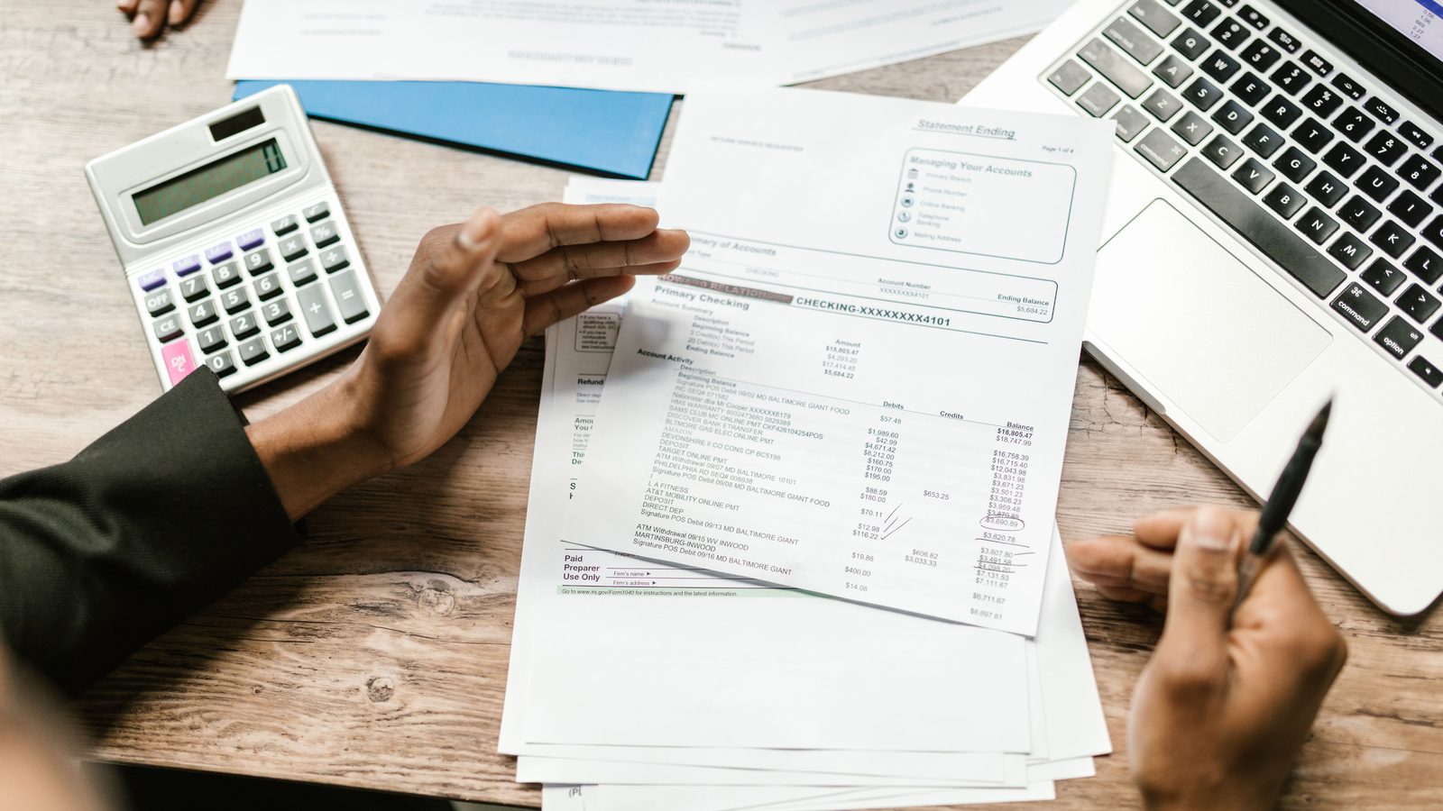 Accountant calculator financial statement.
