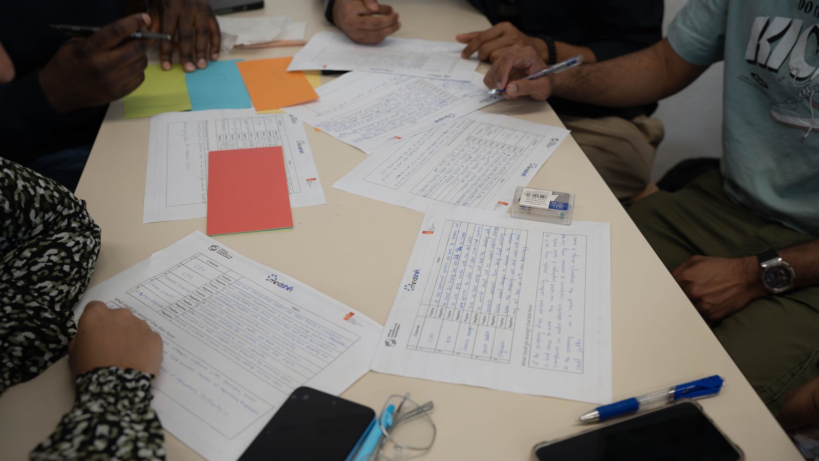 People writing notes workshop anonymous.