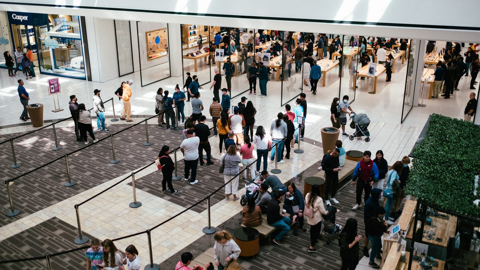 Busy shopping mall crowd people.