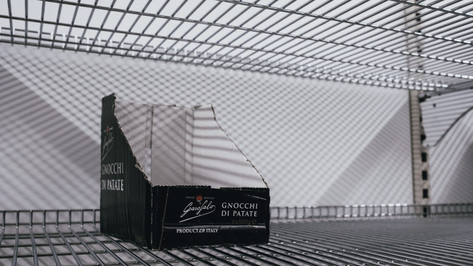 Warehouse shelf low stock gap.