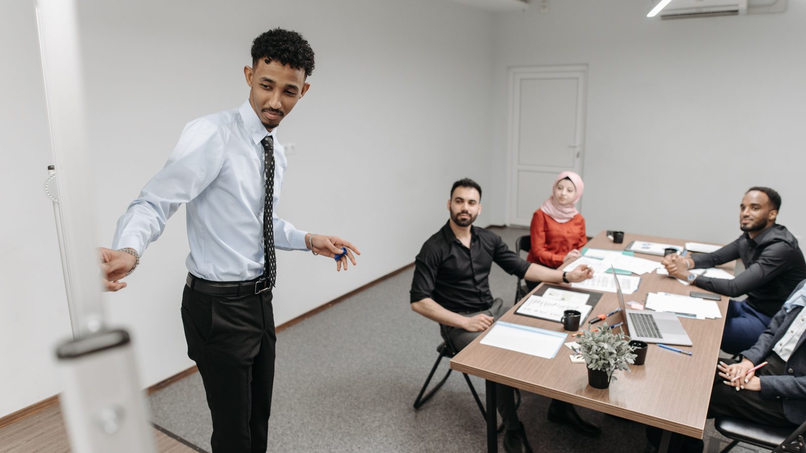 Conference room team meeting presentation.