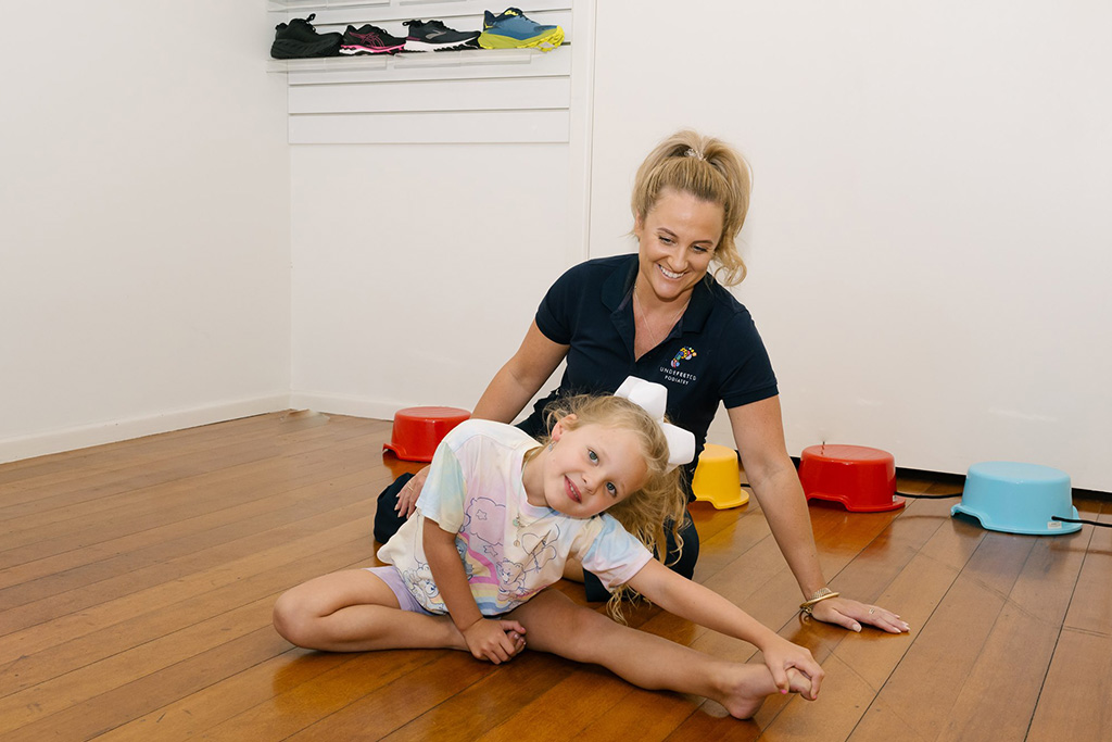 Child receiving a friendly assessment at Undefeeted Podiatry
