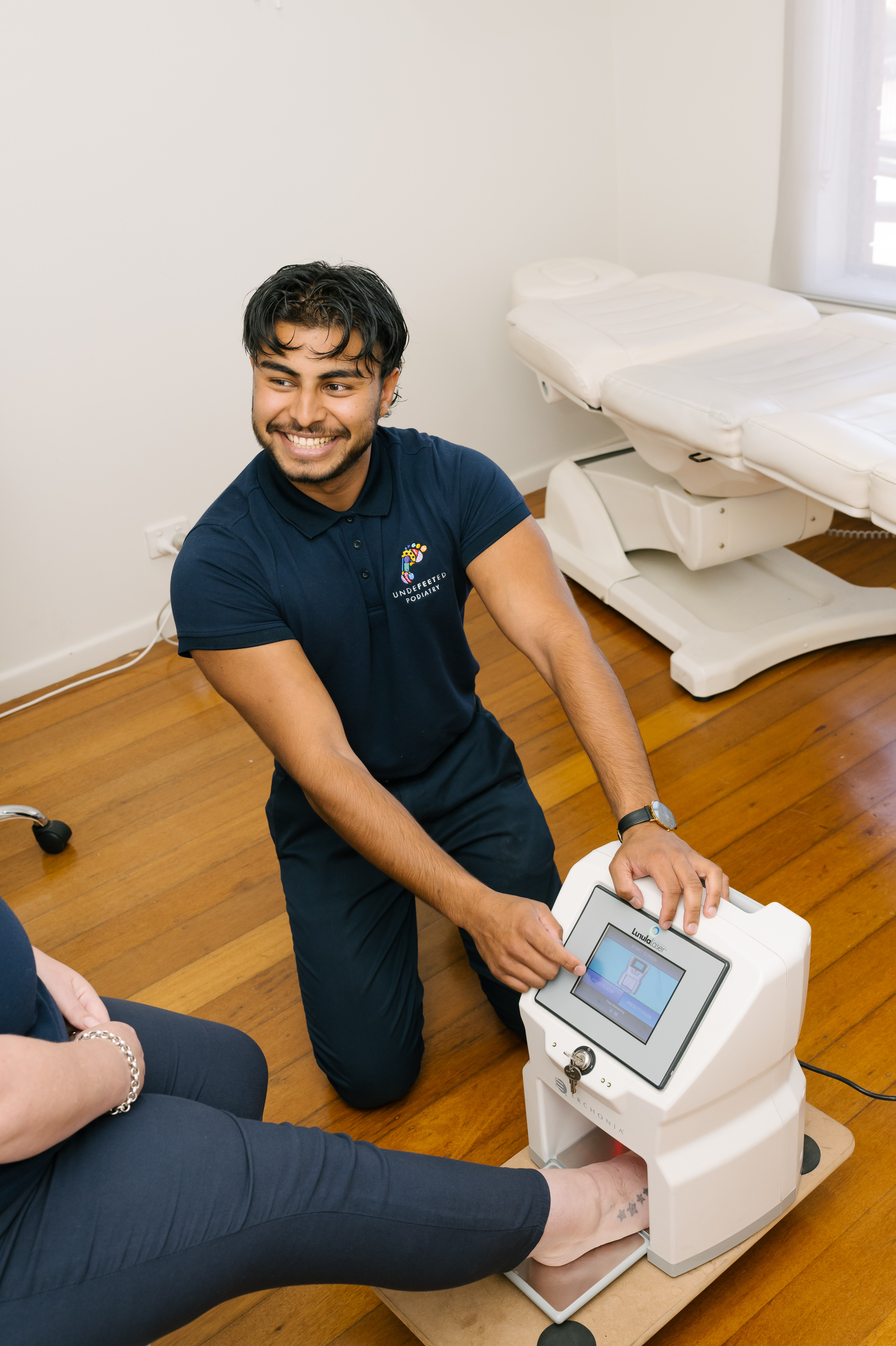 Patient receiving Lunula Laser treatment