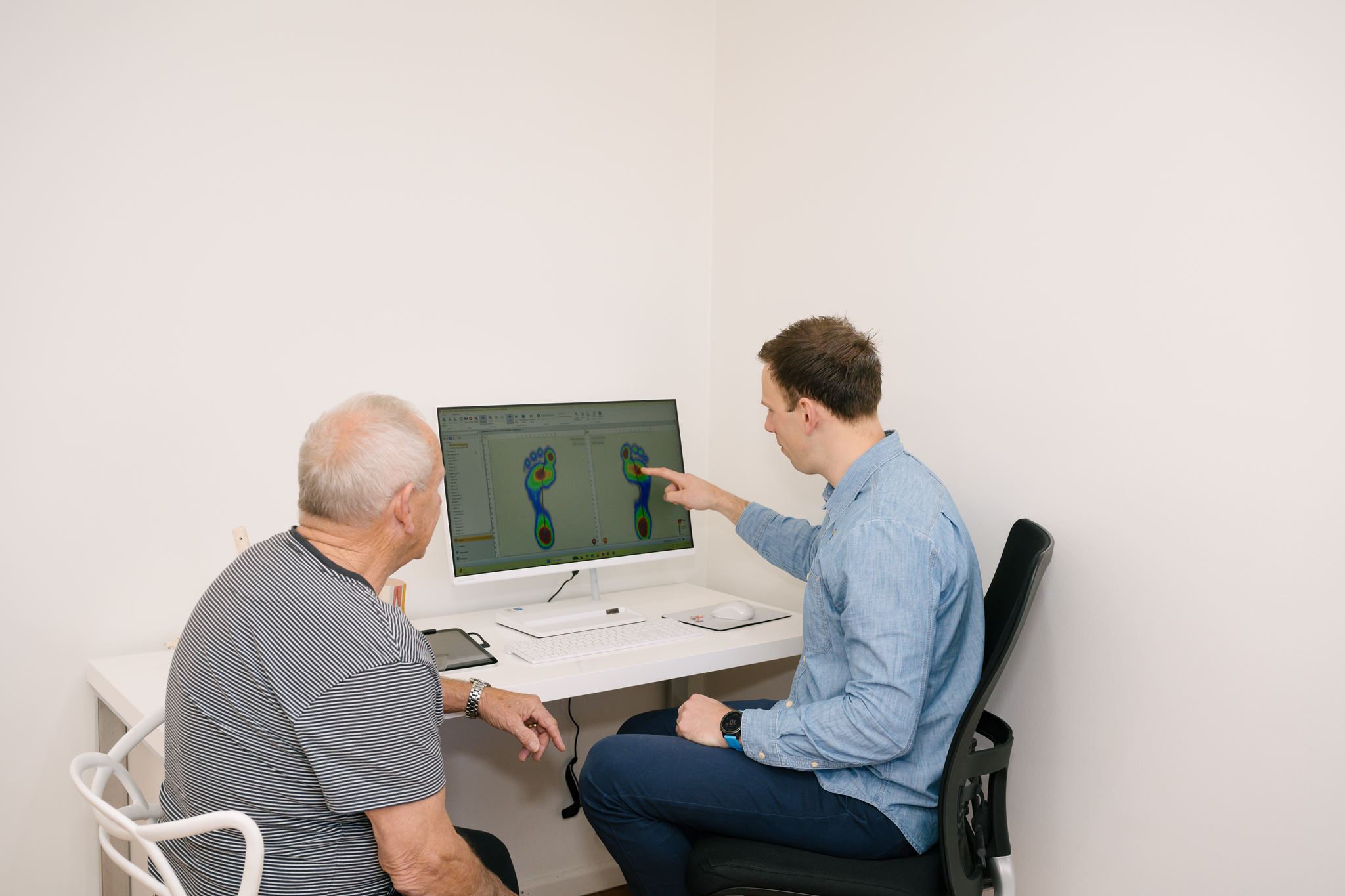 Podiatrist reviewing GaitScan results