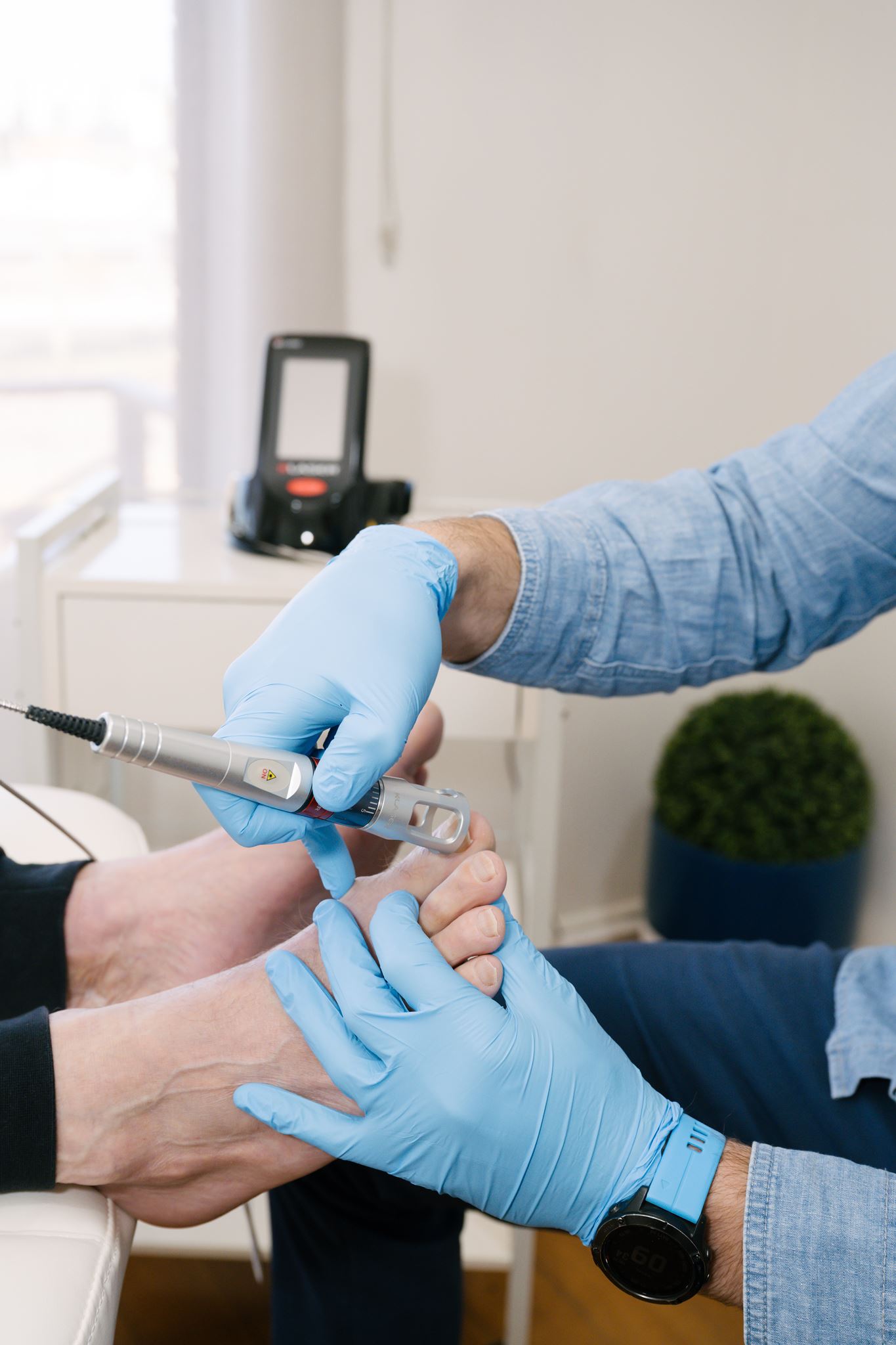 Patient receiving K-Laser therapy