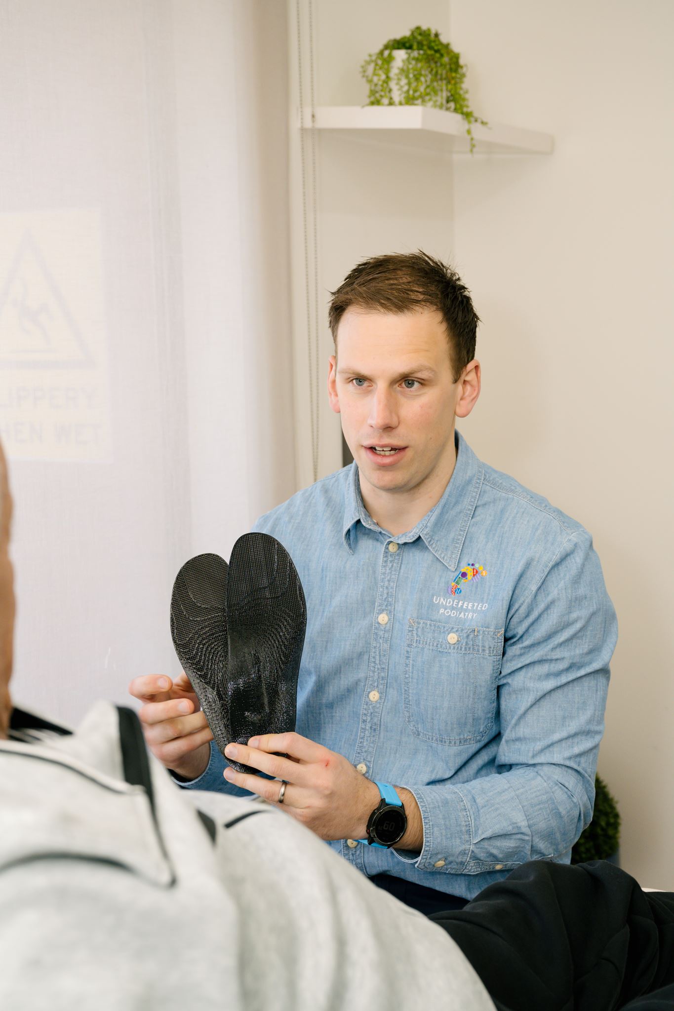 Custom orthotic being fitted
