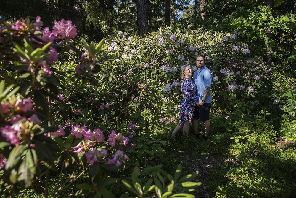 Woman and man in a flower garden