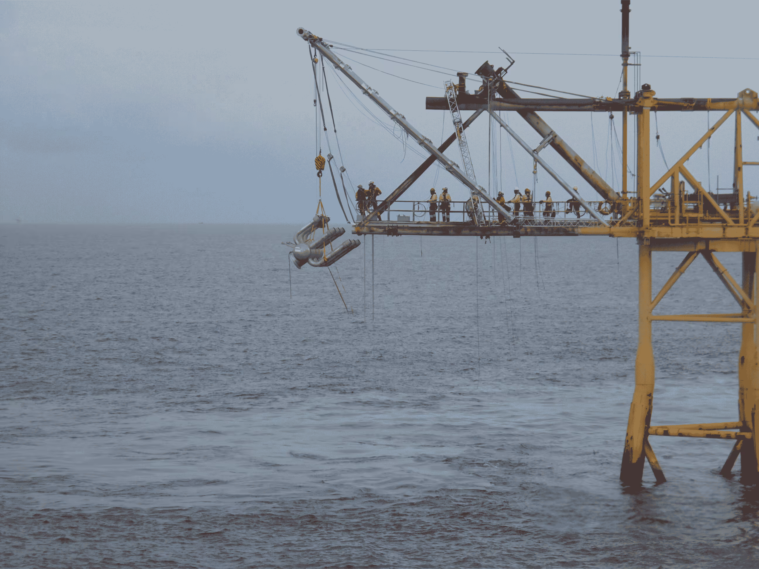 "Flare tip carefully lowered from the bridge and transferred to a supply vessel using high-speed winches, ensuring safe transportation to shore for replacement operations."