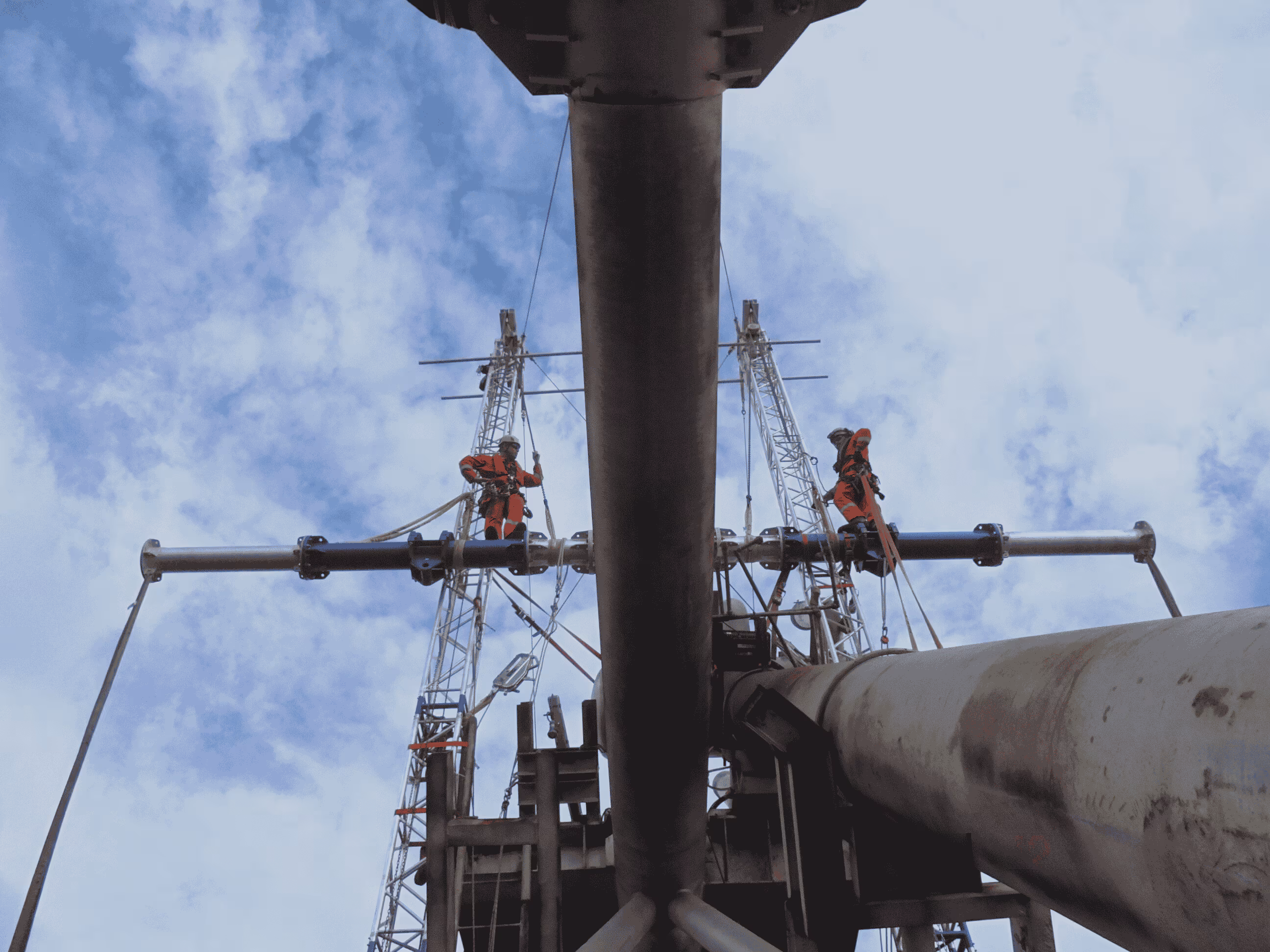 "A modular lifting system constructed from lightweight components extends beyond the bridge structure, enabling efficient lifting operations at the Erawan facility while distributing loads to the bridge's strongest points."