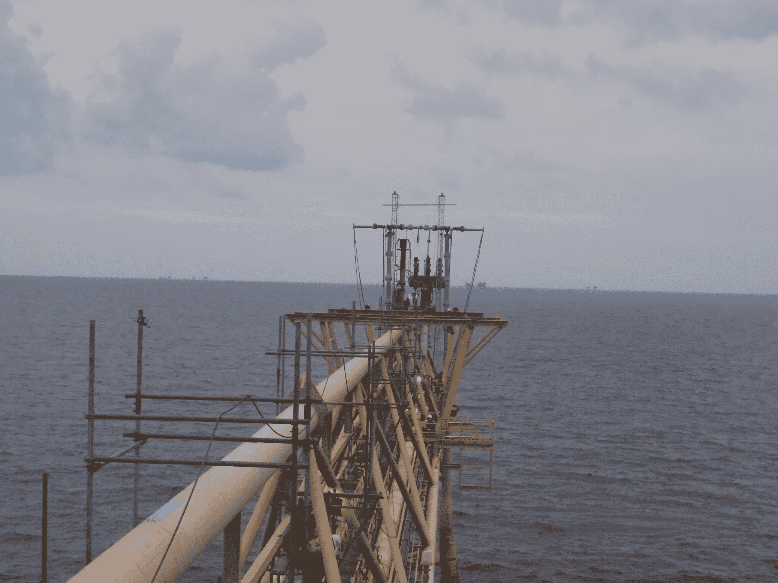 "A modular lifting system constructed from lightweight components extends beyond the bridge structure, enabling efficient lifting operations at the Erawan facility while distributing loads to the bridge's strongest points."