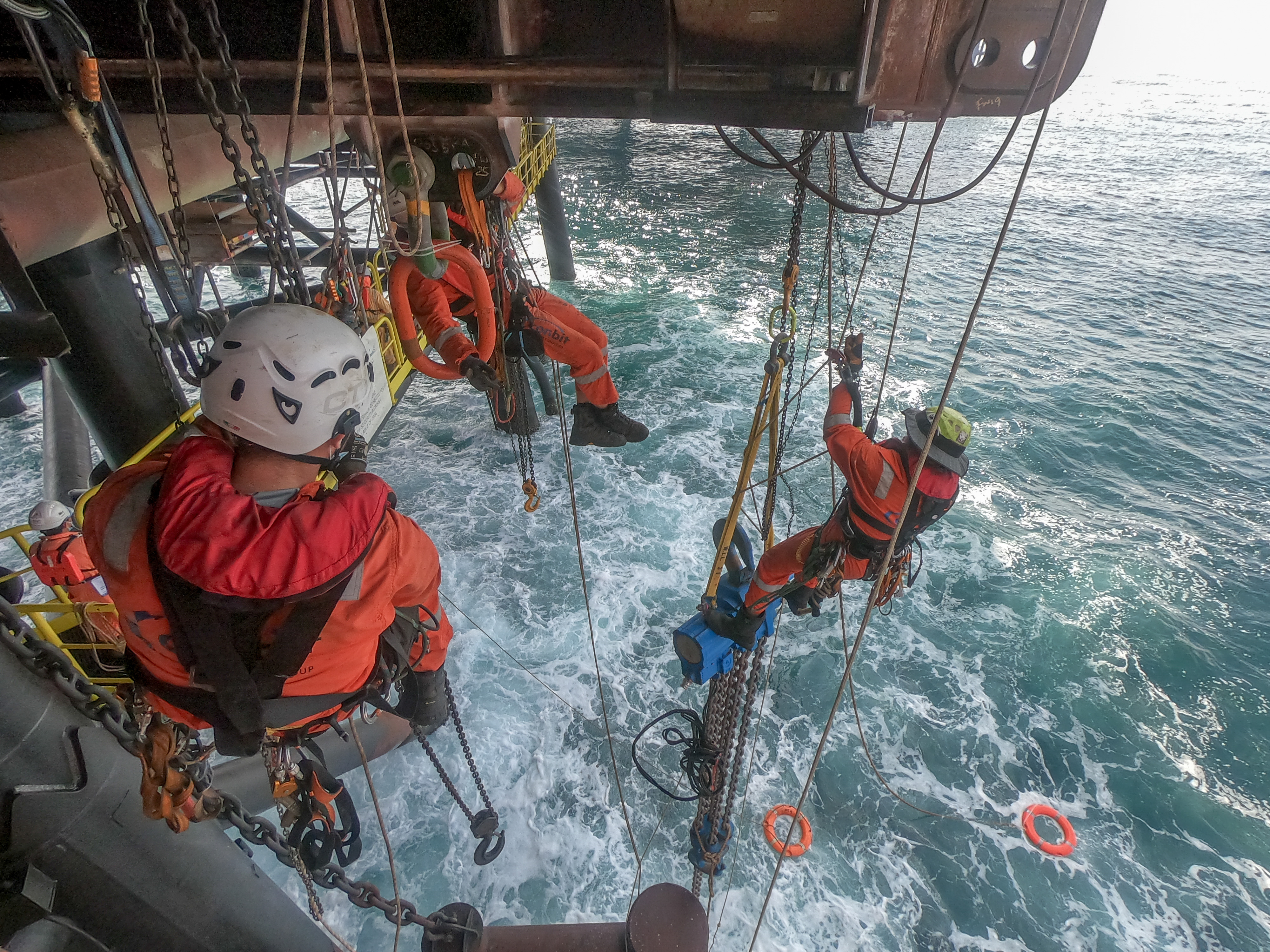 Rope Access technicians at work under the offshore platform