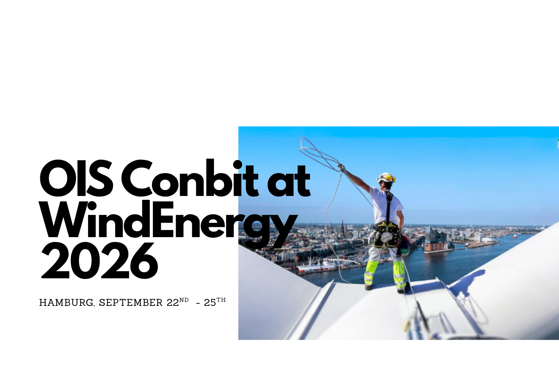 Worker on windturbine overlooking city and water