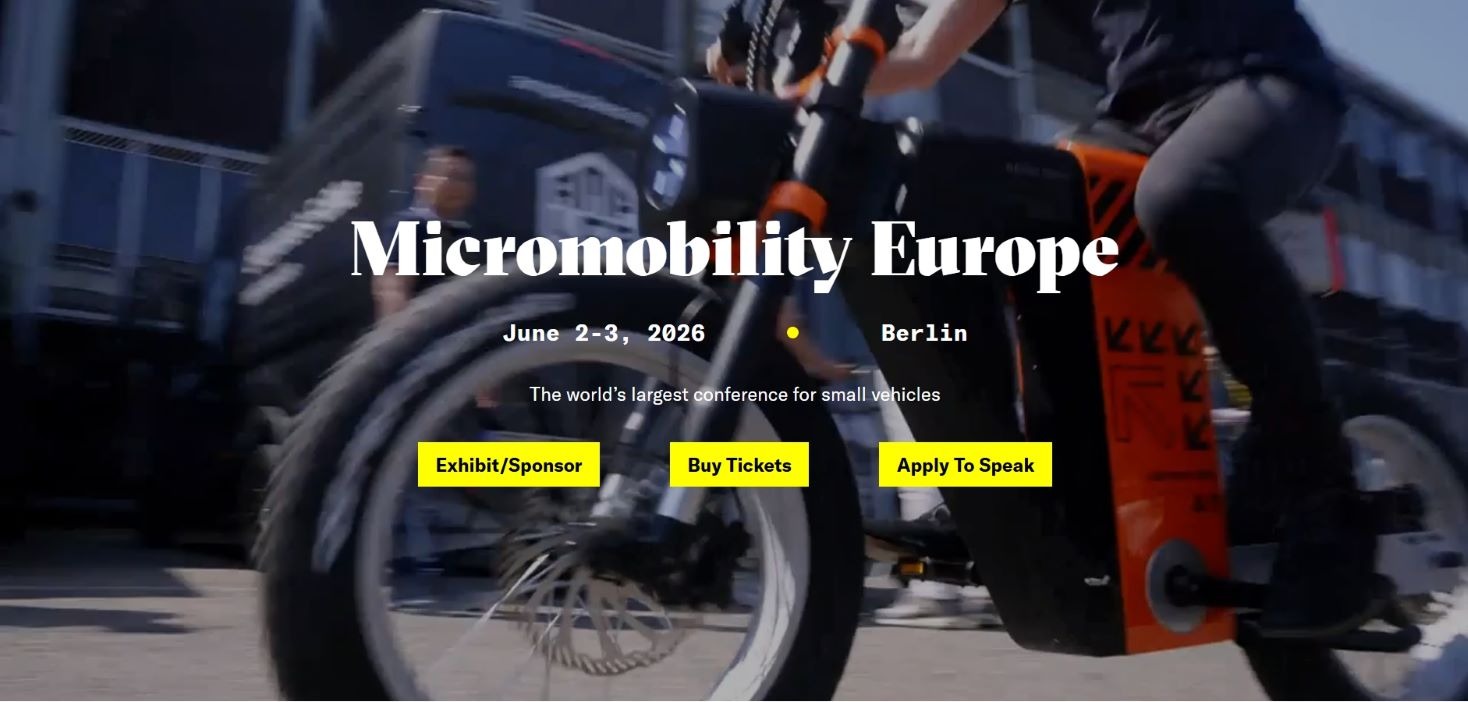 “Promotional banner for Micromobility Europe 2026 featuring a rider on a small electric vehicle in an urban setting. The tagline reads ‘The world’s largest conference for small vehicles.’”