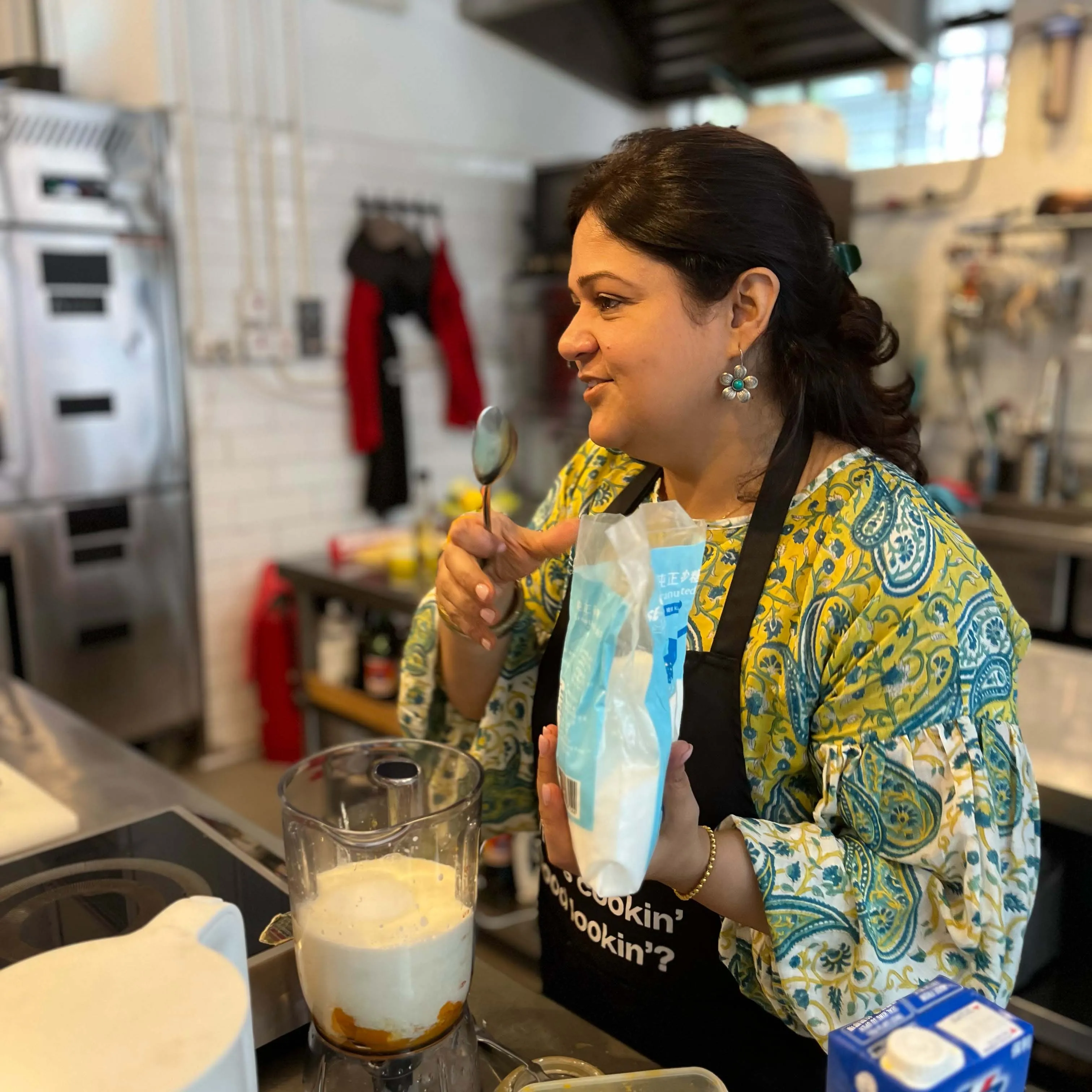 indian chef teaching a cooking class at BiteUnite